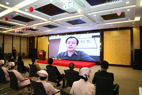 6北京市委宣传部精神文明宣教处处长章力丁通过视频发来祝贺.jpg